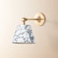 Elbow wall fitting in antiqued brass