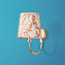 Gramma wall fitting in antiqued brass