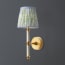 Keneggy wall fitting in clear glass and antique brass
