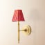 Wrappling wall fitting in antiqued brass