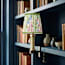 Bronte rechargeable bookshelf light in brass