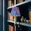 Bronte rechargeable bookshelf light in brass