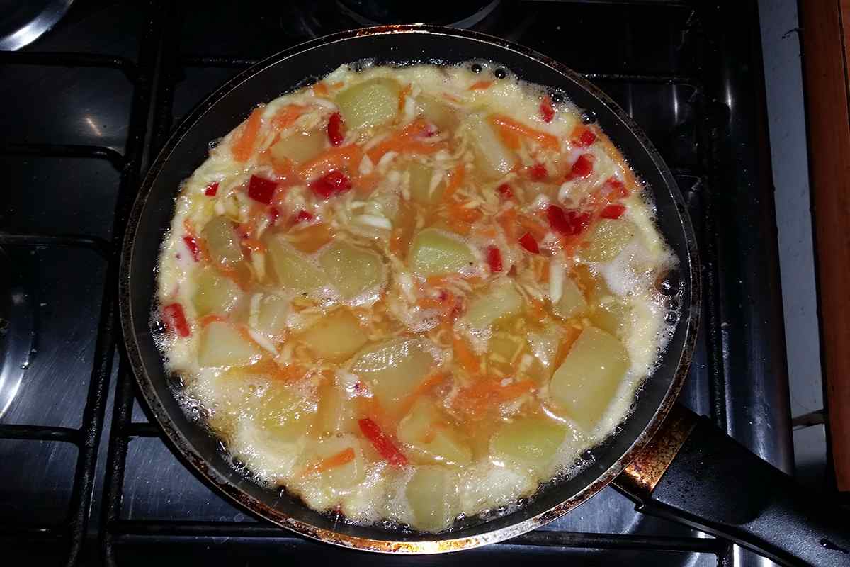 Cocinar tortilla de papas con zapallo italiano cookcina