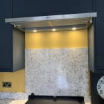 Cooker hood with extractor and light