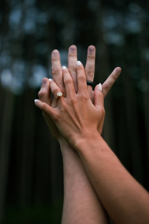 Oval diamond ring on hand