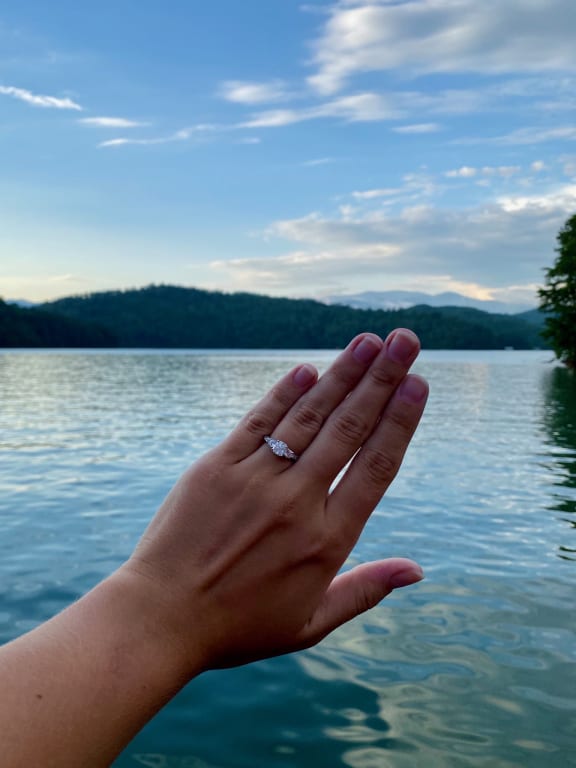 Oval diamond ring on hand