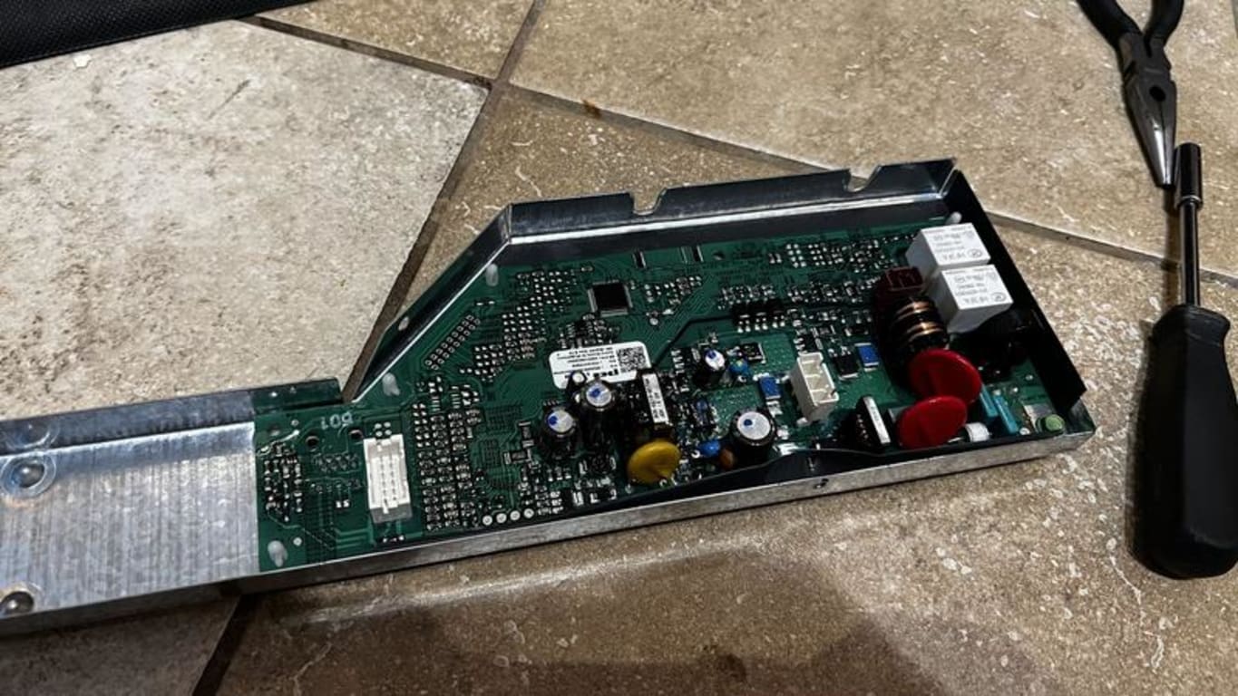 The control module bracket with the board inside The control module bracket with the board inside