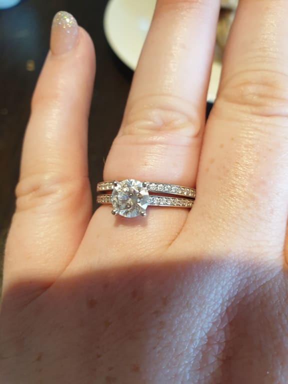 Oval diamond ring on hand