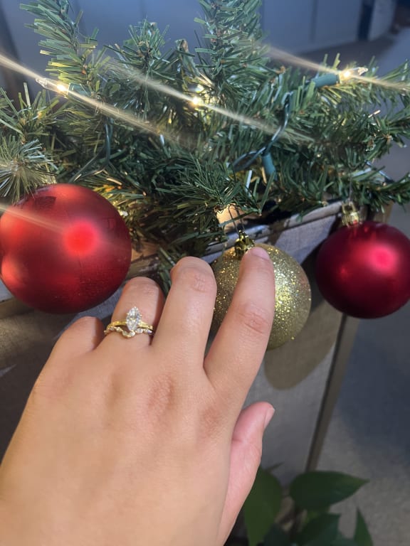 Oval diamond ring on hand