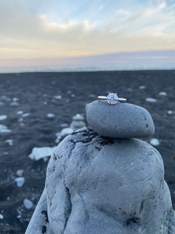 Oval diamond ring on hand