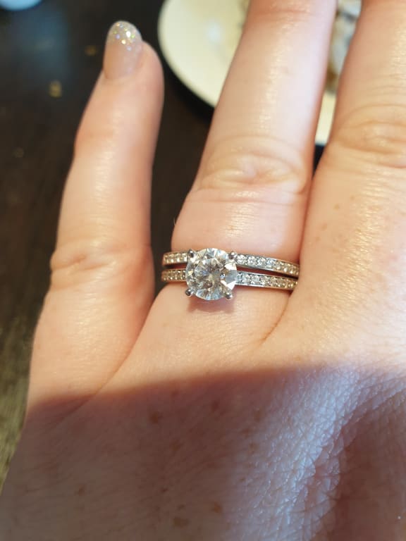 Oval diamond ring on hand