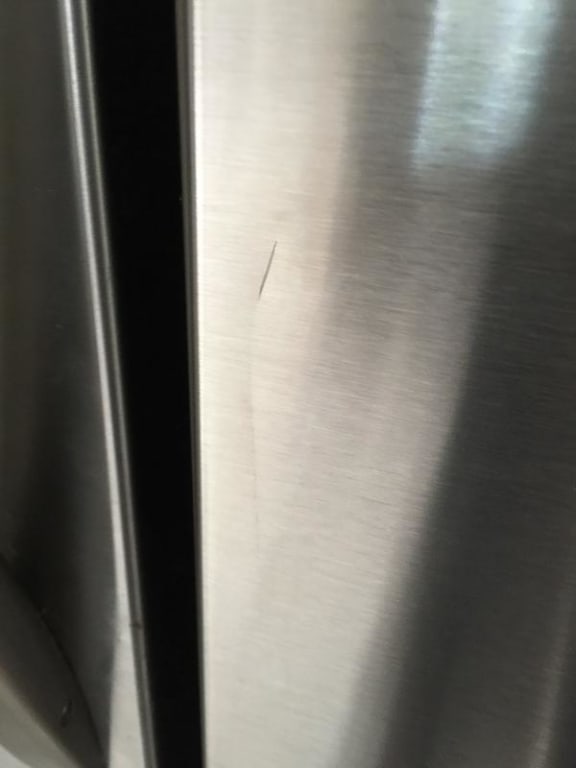 Pic of the new door that came with a scratch - it held us over until the new door without the scratch was delivered. Pic of the new door that came with a scratch - it held us over until the new door without the scratch was delivered.