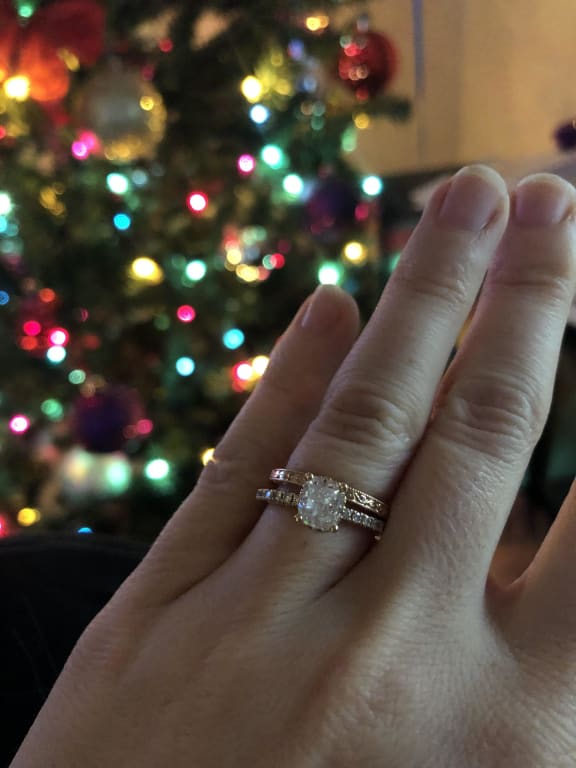 Oval diamond ring on hand