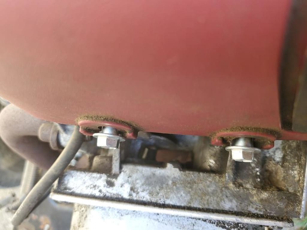 Bolts bottom out but too long to secure cover Bolts bottom out but too long to secure cover