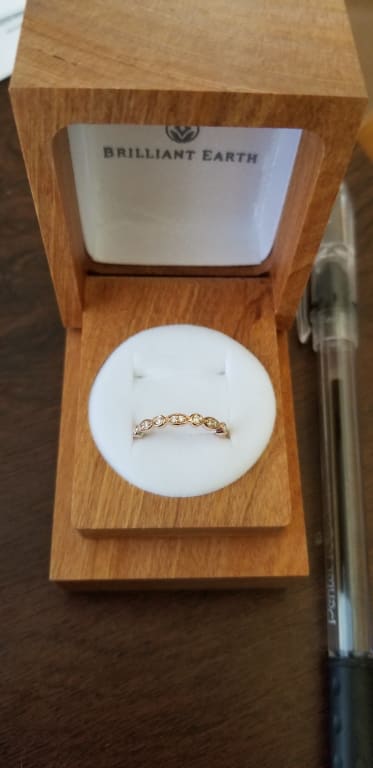 Oval diamond ring on hand