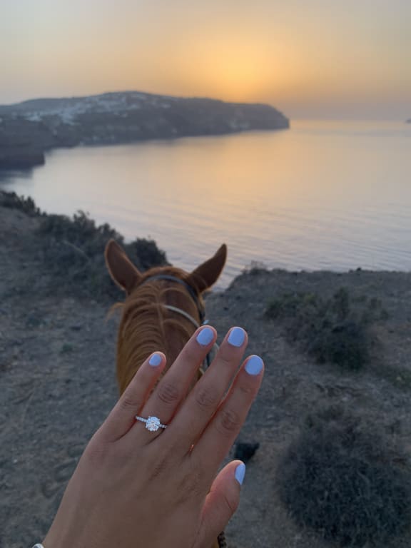 Oval diamond ring on hand