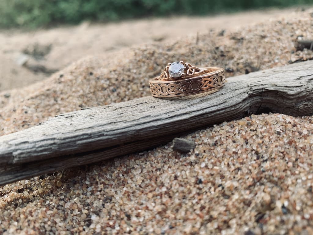 Oval diamond ring on hand