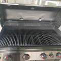 Multiple cooking surfaces allows varied heat for use in conducting large or small items to grill together.