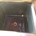 Warped liner in tub.