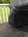 Velcro straps on the grill cover at each end