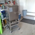 Cart with oven bolted to it. Very sturdy and convenient!