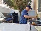 Enjoying my outdoor kitchen!  The Napoleon Grill makes it complete.