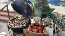 3 dozen Jalapeno Poppers and 2 dozen wings; Charcoal grate is lowered to reduce flair ups from the greasy cook.