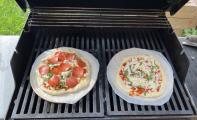 Two pizzas side by side