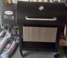 My grill after assembly, note bottom shelf