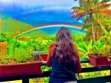 My wife enjoying our deck views as she awaits her shrimp!