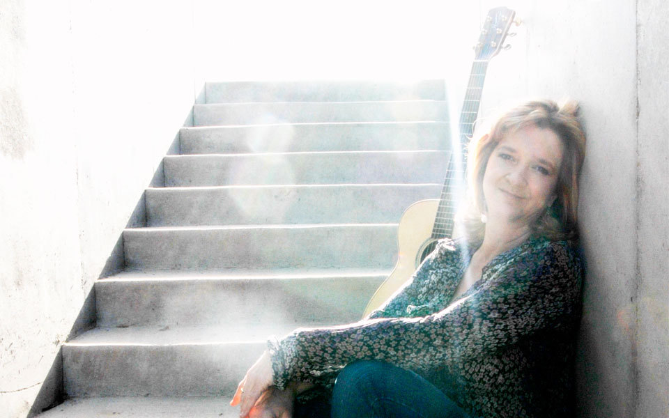 anne on stairs with light home
