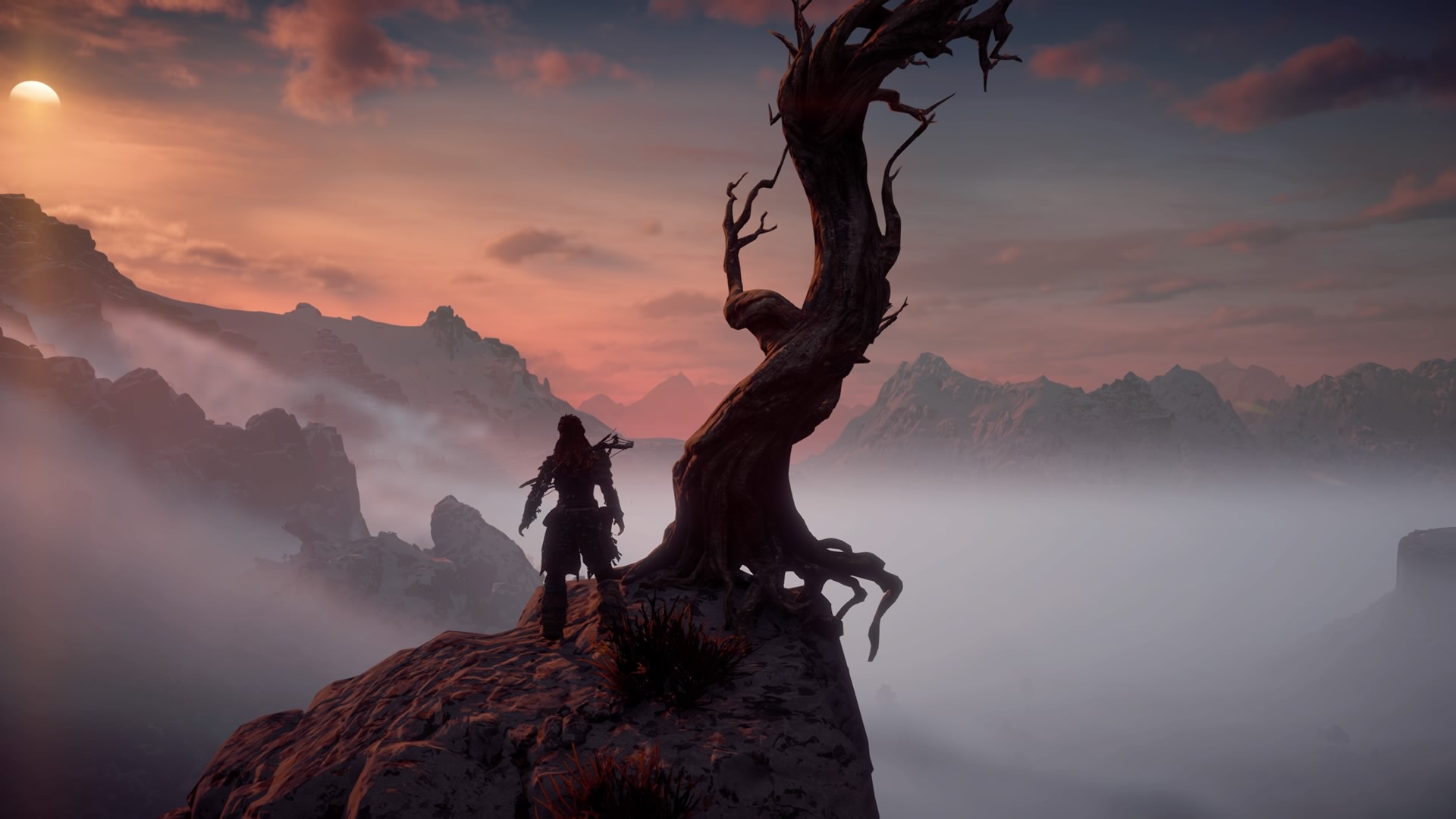 Aloy overlooking a misty landscape in Horizon Zero Dawn