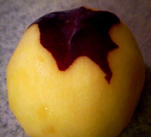 Mostly peeled Peach Peeling the Peach