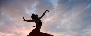 Jumping Woman at Sunset