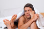 Frustrated Couple in Bed