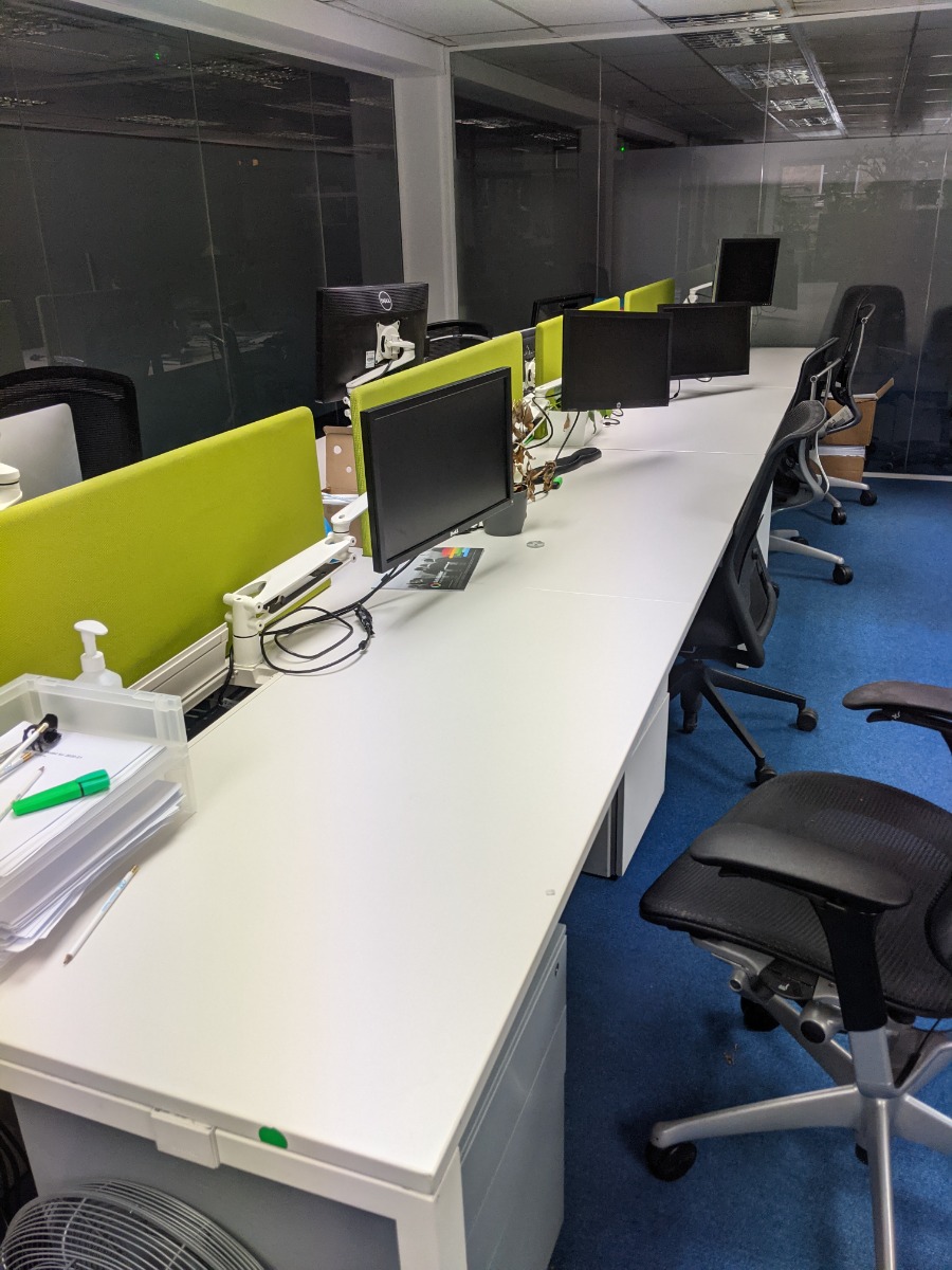 Bank of 4 desks x 2 Surplus office furniture and equipment for next