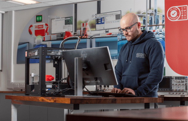 man designing with 3D printer