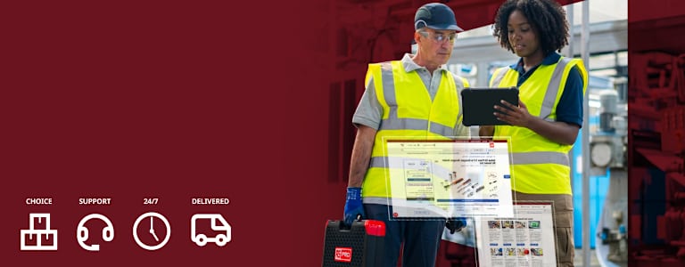 Image of two people wearing fluorescent safety vests and holding an iPad