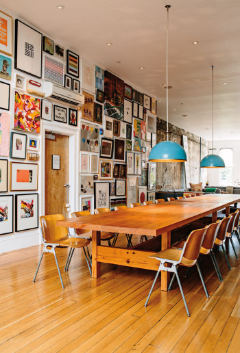Vintage Castelli chairs surround two custom dining tables by Herb Belrose