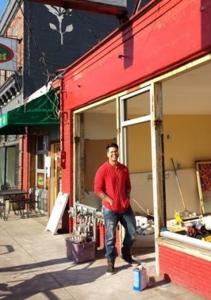 Micah Camden outside the under-construction Blue Star Donut Hawthorne