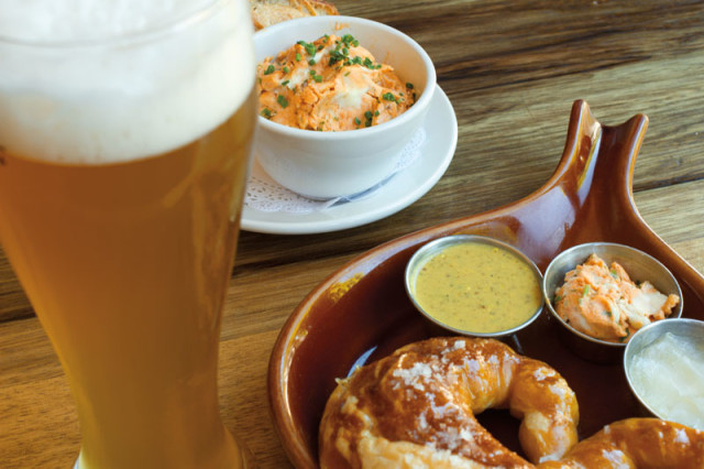 Obatzda (left) and Bavarian pretzels served with house-made mustard and schmaltz