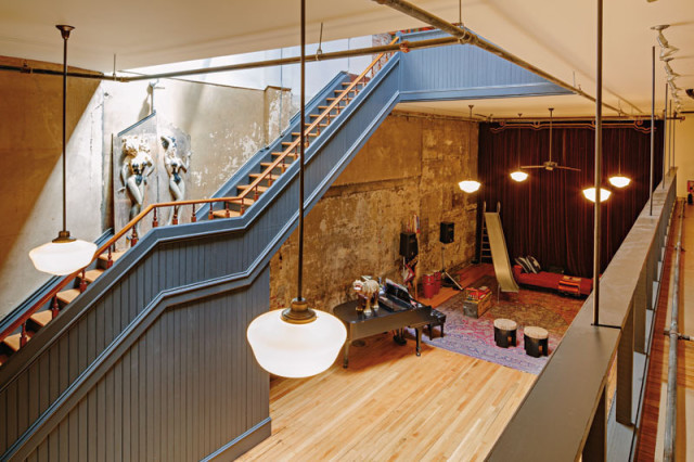 Lauderdale’s rehearsal space sits at the base of a skylit stairwell that winds past bas-reliefs from downtown landmark Mary’s Club.