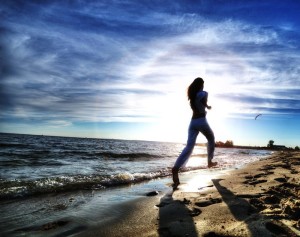 Woman running on beach