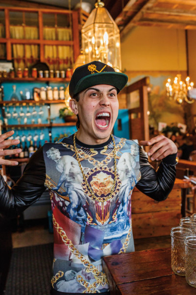 Bartender Brandon Gomez at Ned Ludd’s Weekly hip-hop and pizza–fueled P.R.E.A.M.