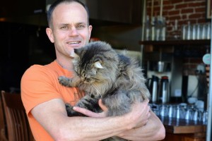 Matthew Busetto with Firehouse's resident supercat.