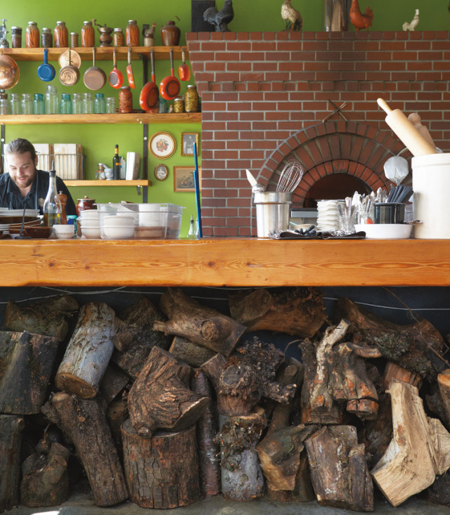 Brandon Cunningham behind counter at Ned Ludd.