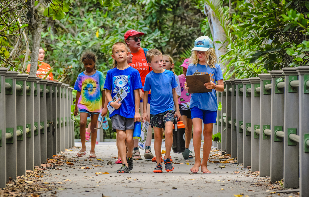 Kids walking on boardwalk