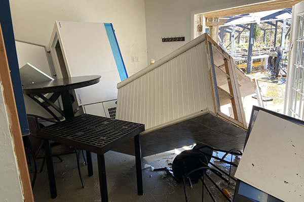 image of flipped over fridge