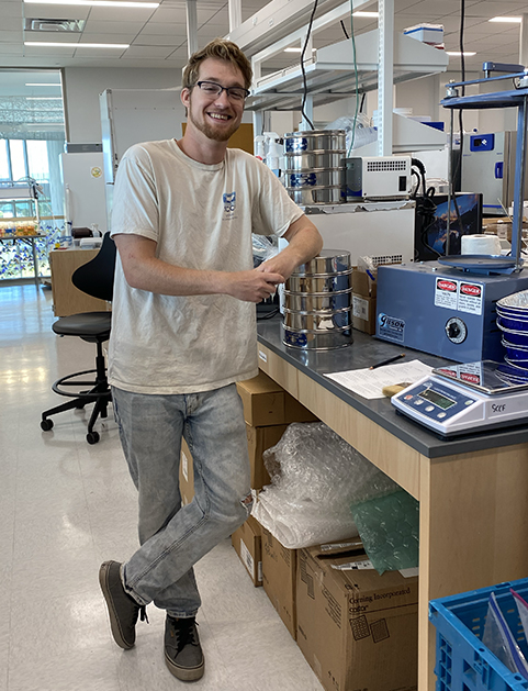 image of person smiling in lab