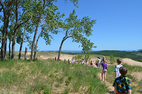 Children hiking along trails within Sleeping Bear Dunes National Lakeshore